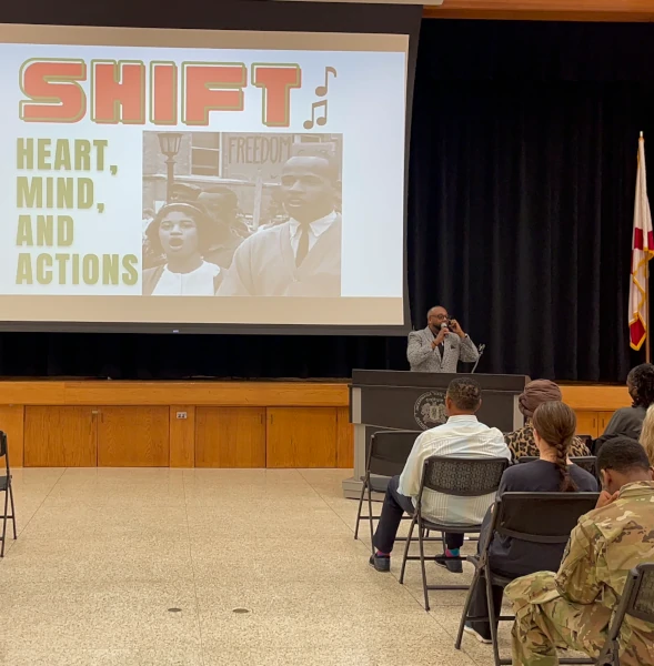 Photograph of DK Price giving a presentation